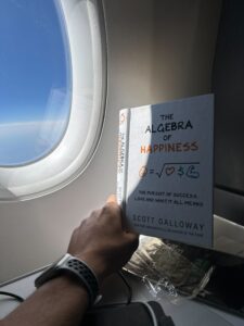 Book About Money Not Making You Happy, that I read in my Delta One seat on my way to South Korea
